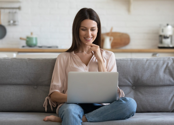 Woman setting up telepsychiatry appointment in New York.